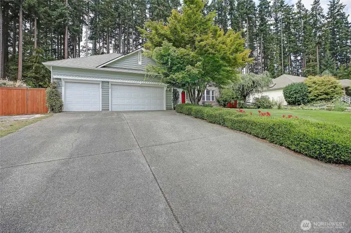 Spacious driveway welcomes you home to your 3 car garage!