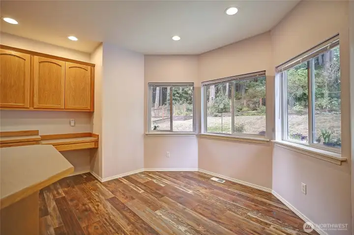 Kitchen offers a casual dining area with beautiful windows!