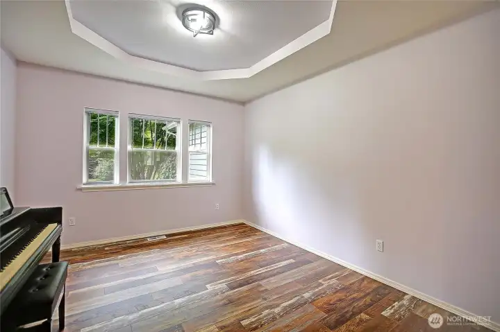 Large dining room offers a beautiful large window & plenty of space for a large table!