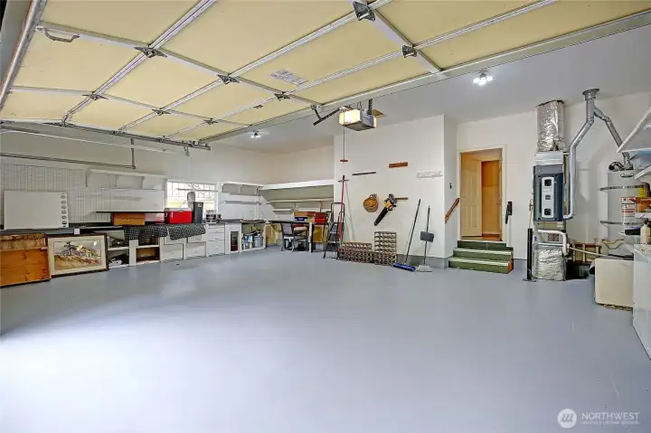 Huge 3 car clean and neat garage! New fabulous floors!