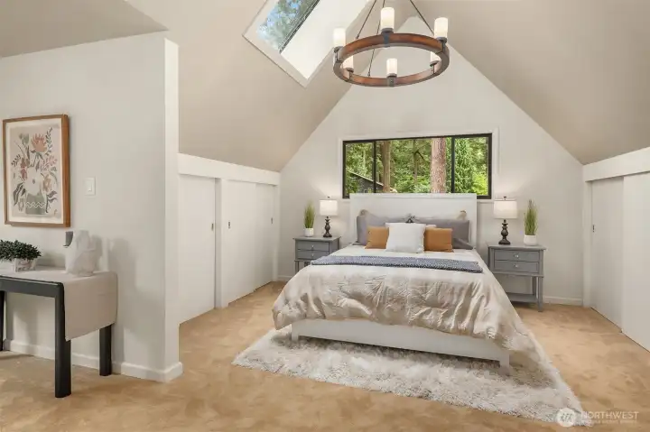 Primary Bedroom with vaulted ceilings