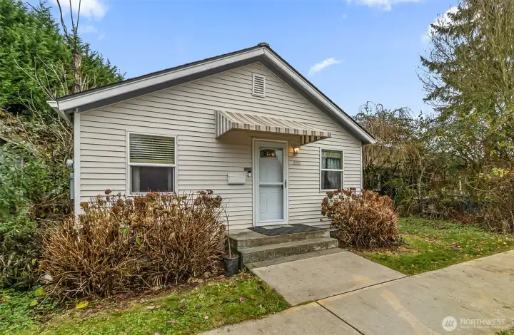 Quaint Cottage Style Home on a Corner Lot is Looking for New Owners...Come in and Take a Peek