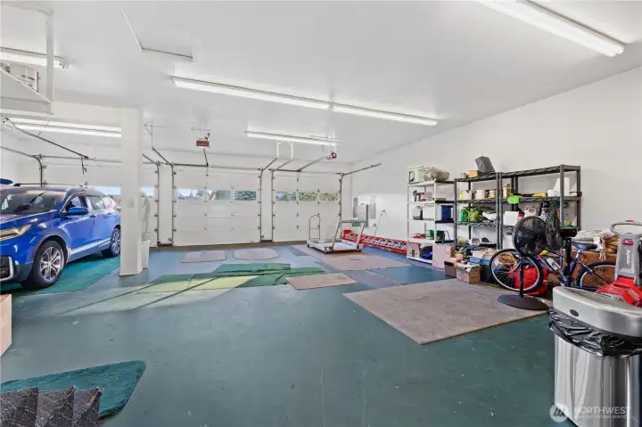 Attached garage can hold up to 5 cars - fridge and freezer in here can convey if buyer wishes.