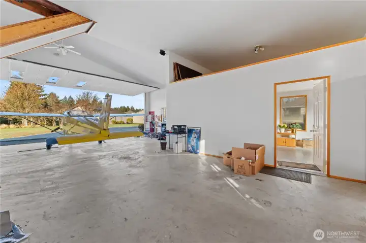 Inside the hanger with the doors open - don't forget the hydraulic lift stairs up to the huge attic space.