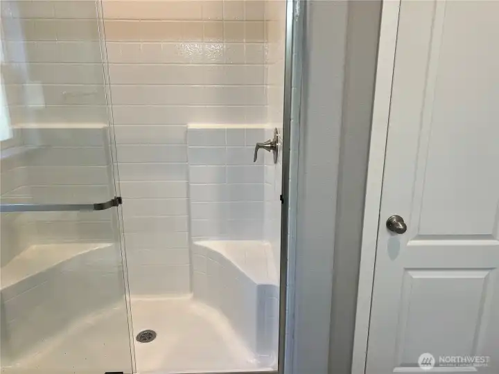 Primary bathroom with walk in shower.