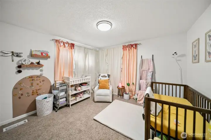 Bedroom 2 is cheerful and enough space for a king size bed