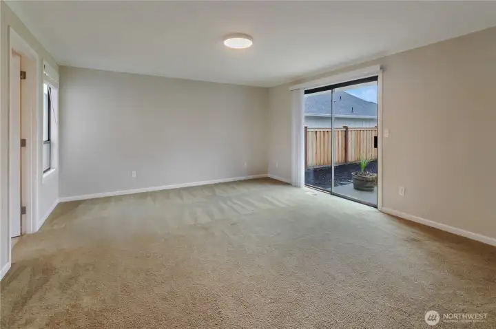 Primary Bedroom Suite was created out of 2 original bedrooms and now includes a slider to the backyard, a well-appointed walk-in closet and 3/4 Bathroom.