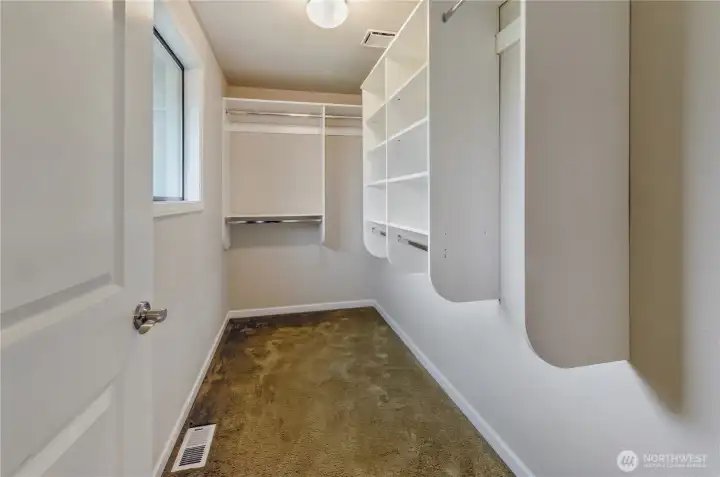 Walk-in closet is well-appointed and has more natural light!