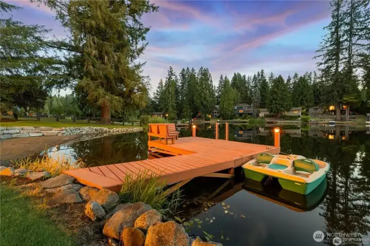 Waterfront Lifestyle awaits with 135' of fun with nice entertainiing dock. Enjoy all that the lake offers with Boating, Paddleboarding, Fishing & Swimming.