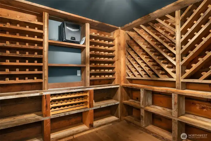 Wine cellar with reclaimed wood from original home.