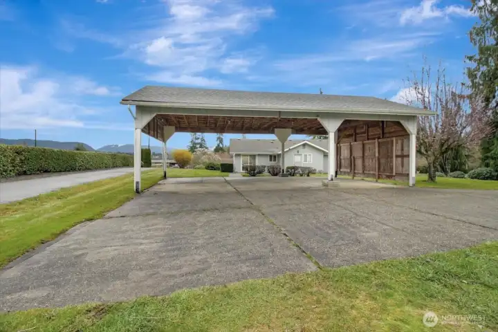 3 car, carport at back entry