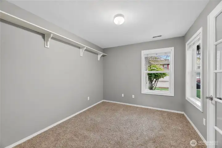 OFFICE / DEN  French doors / Upper display or storage shelf / Views of the front yard