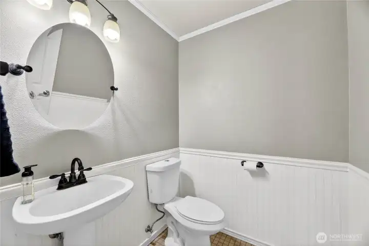 ½ BATH with pedestal sink and tile floors