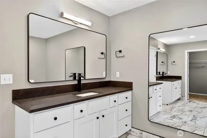 Dual and separate vanities with undermount sinks