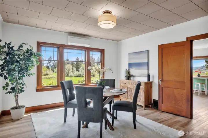 Dinning space with a view overlooking the lower property.