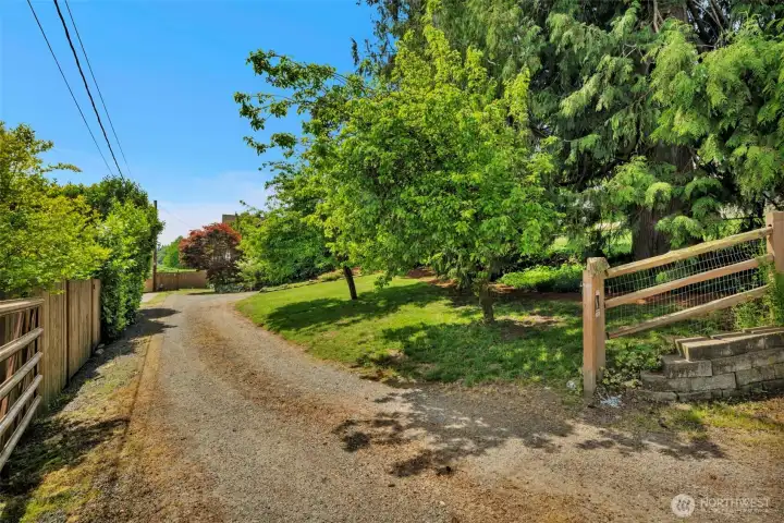 Gated entrance with extra parking space.