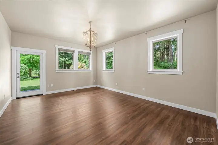 Primary bedroom with a door to the back patio so you have easy access to the hot tub