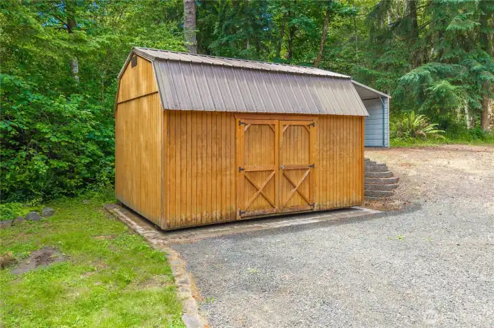 Bigger shed. Also, behind it is the carport