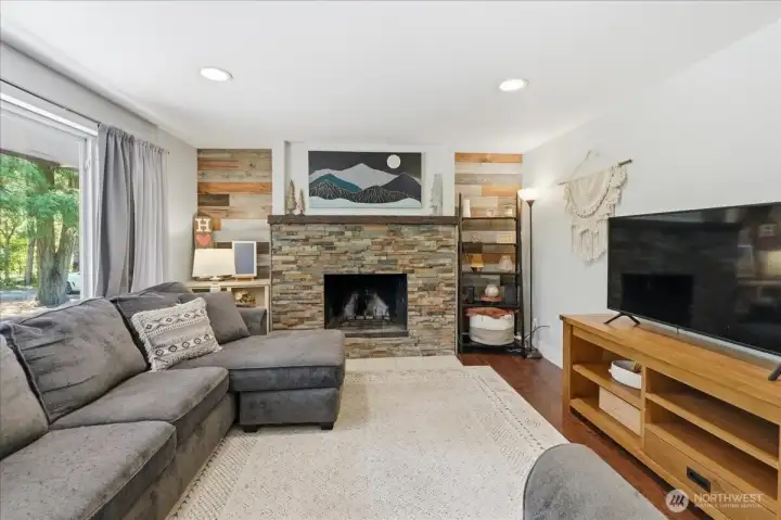 Inviting living room with a cozy fireplace. Inviting living room with a cozy fireplace.