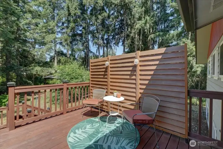 Step through the sliding glass door onto the spacious backyard deck. Step through the sliding glass door onto the spacious backyard deck.