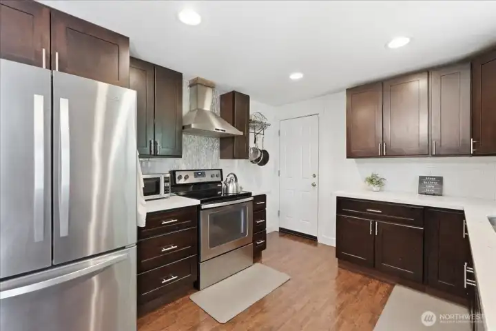 Updated kitchen with modern finishes. Updated kitchen with modern finishes.