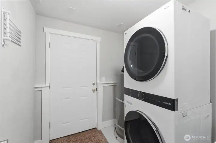 Laundry area with back door to your enormous back yard. Laundry area with back door to your enormous back yard.