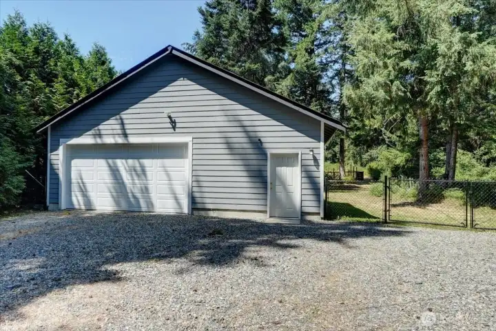 The impressive 32' x 26' detached insulated shop offers exceptional functionality with 10-foot ceilings, 8-foot doors, and plenty for space for hobbies, storage, or projects. The impressive 32' x 26' detached insulated shop offers exceptional functionality with 10-foot ceilings, 8-foot doors, and plenty for space for hobbies, storage, or projects.