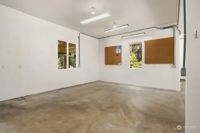 The 1,246 sf garage has a large workshop area. The garage has three bays and also has air filtration.