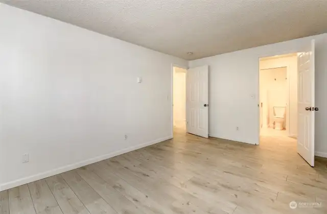 Primary Bedroom, hall to the left, closet-bathroom on right