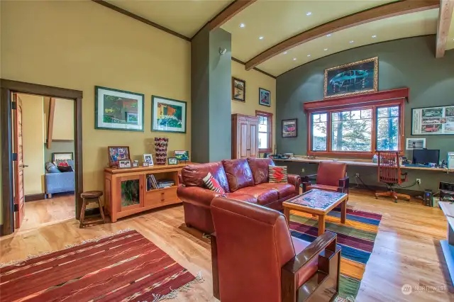 Full length desk creates utility on the west wall overlooking President's Channel with a Stickley leather sofa awaiting you for that needed break.