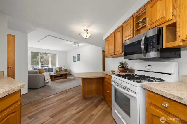 Kitchen flows seamlessly into second living room which could also be the perfect office, TV room, or breakfast nook.