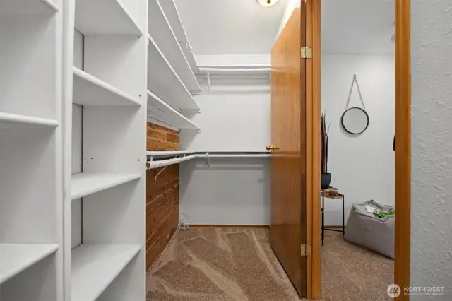 Primary bedroom's large walk-in closet.