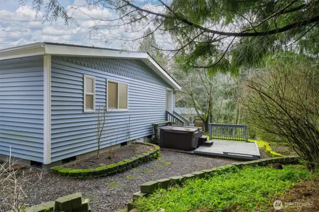 Lightly forested backyard.