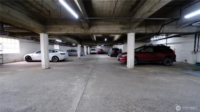 Parking garage with one spot with the condo.