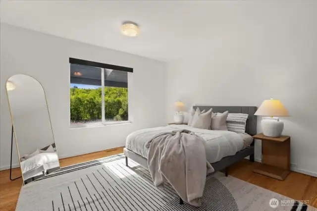 Bedroom #3 with views of the garden & estuary