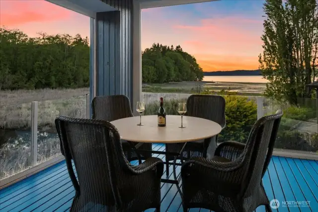 Enjoy sunsets and watching the otters come home from your private deck.