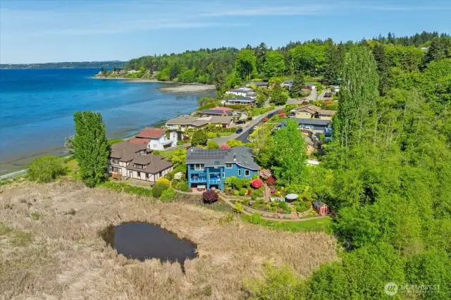 Home borders Dumas Bay Sanctuary providing peace and privacy.