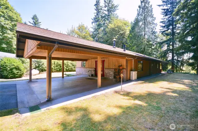 Sidewalks surround both sides of home for easy access to back patio. Water spigots on each side of home for easy water access.