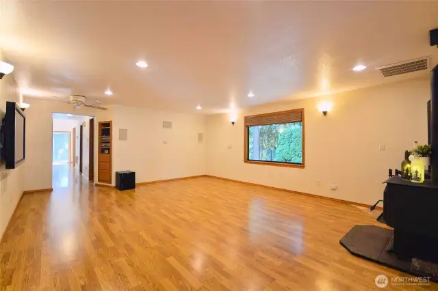 First living space welcomes you with wood burning fireplace to heat the whole home and has been vented to heat the whole home. Propane stove for back up.1st living room measures 16 x 21. TV stays as well. Entertain with the built-in surround sound system with built in cabinet and drawers.