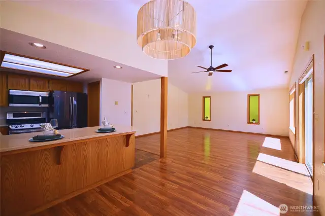 Open concept living, Kitchen opens up to the second living room space  17 x 19 and dining room is 7 x11. The windows are large picture windows giving you views of the beautiful backyard and river serenity at its best..