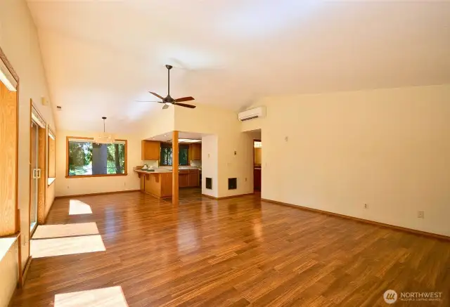 Large living room space with ample light and view from every angle.