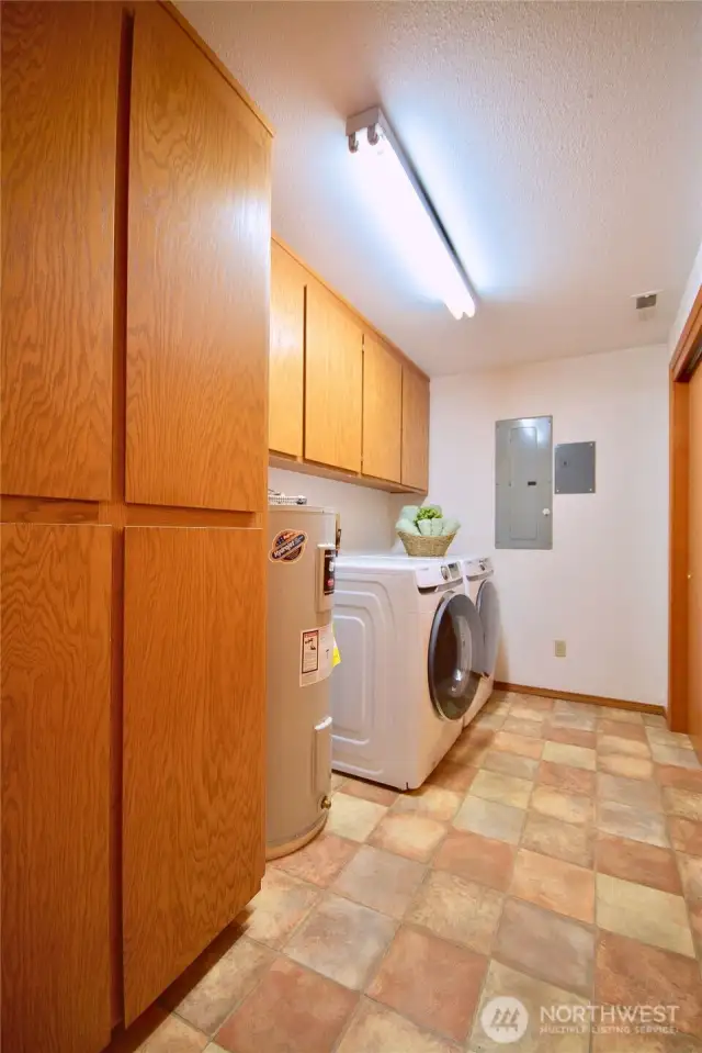 Large laundry space along with extra storage.