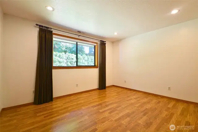 second bedroom, Ample light. Wood wrapped window.  Room Measures 13 x 11