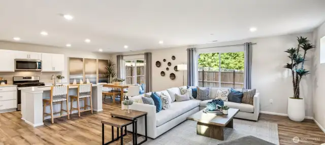 Open Concept living/dining/kitchen-Disclaimer- Photos are another Noah floor plan from another community, photos are for illustrative purposes only. Finishes, flooring, upgrades, or other features may vary.
