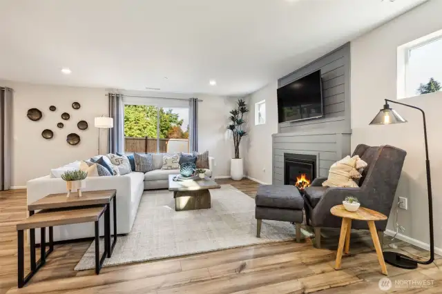 Open Concept living/dining/kitchen-Disclaimer- Photos are another Noah floor plan from another community, photos are for illustrative purposes only. Finishes, flooring, upgrades, or other features may vary.