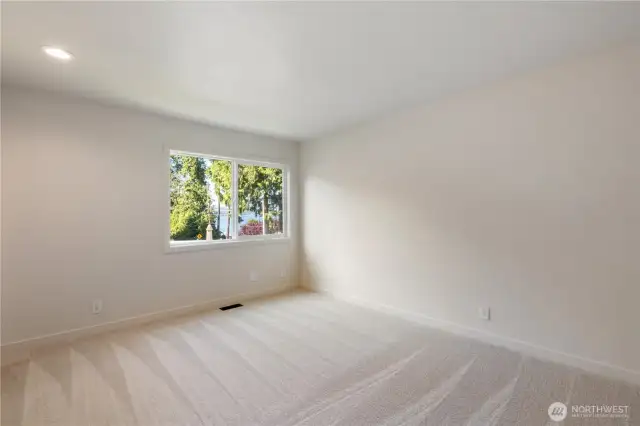 Bedroom 3 offers magnificent lake views.
