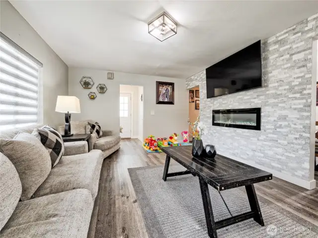 Fireplace and open flow to kitchen