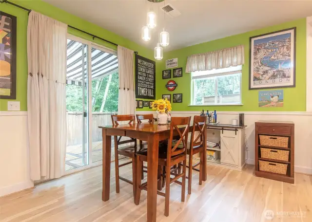 Dining space leading to perfectly appointed back yard.