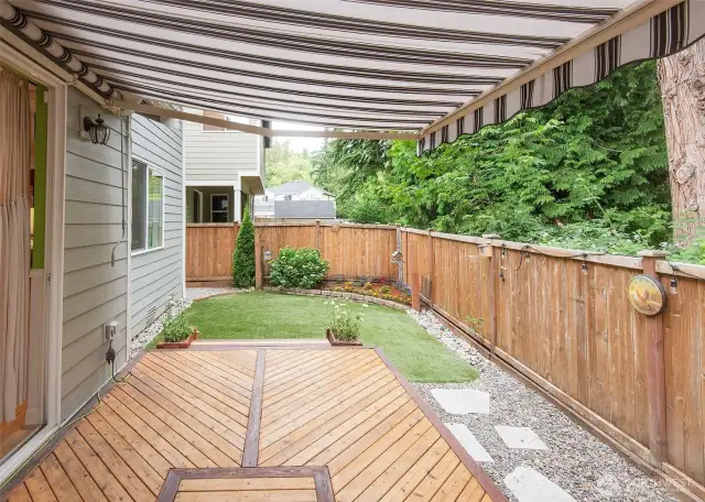 Back deck with retractable awning.