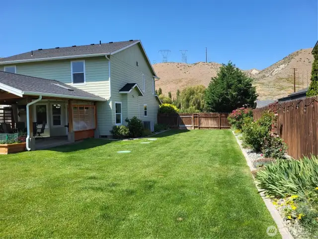 South Side of House; Access to Yard Via Gate